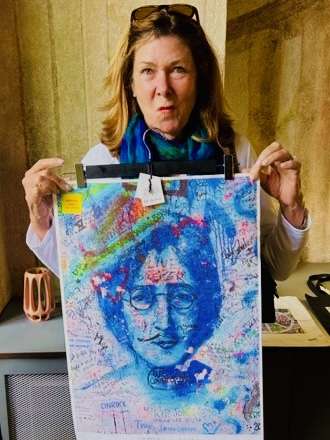 Robin Holding Picture of John Lennon: Graffiti Art